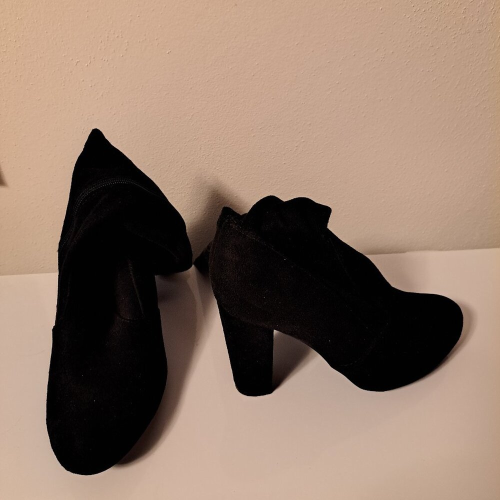 2 Pairs of size 8 Boots and readings..$100.00 per pair readings are $15